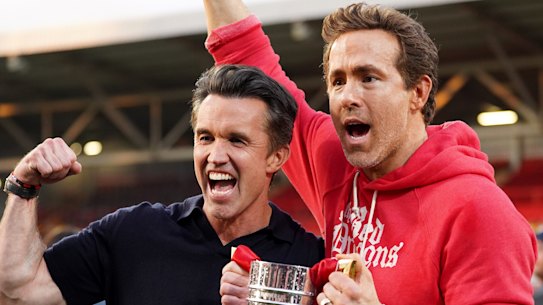 Rob McElhenney and Ryan Reynolds celebrate Wrexham’s latest promotion.