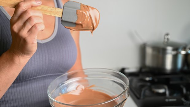 Use your spatula to regularly scrape down the sides of the bowl.