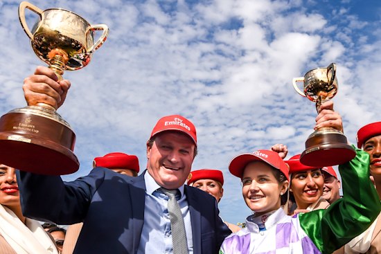 Darren Weir and Michelle Payne after Prince Of Penzance won the 2015 Melbourne Cup.