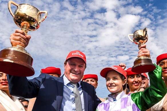 Darren Weir and Michelle Payne after Prince Of Penzance won the 2015 Melbourne Cup.