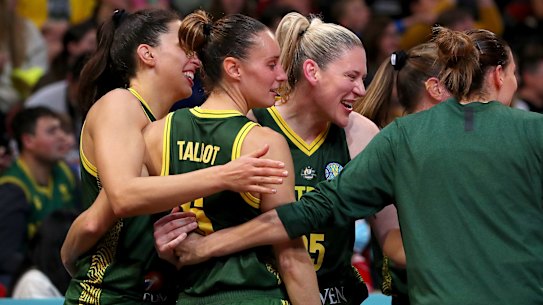 Lauren Jackson of Australia celebrates with team mates after their win over Belgium.