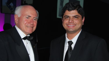  Dr Malay Rana, a keen cricketer, at the Bradman Gala charity dinner with former prime minister John Howard. 