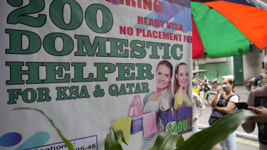 A sign in the Philippines, a leading source of global labour, which has fought with alarm the spike in the number of Facebook pages used for illegal job recruitment and human trafficking in the last two years. 