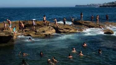 Swimmers cool off in Giles Baths in Coogee.