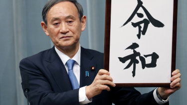 "Uncle Reiwa": Japan’s Chief Cabinet Secretary Yoshihide Suga unveiling the name of new era “Reiwa” in April 2019.