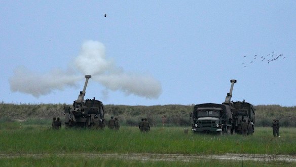 Philippine troops fire shots during the Balikatan military exercises earlier this month.