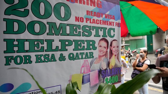 A sign in the Philippines, a leading source of global labour, which has fought with alarm the spike in the number of Facebook pages used for illegal job recruitment and human trafficking in the last two years. 