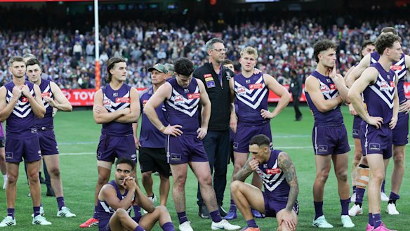 The Dockers look on after losing the grand final in the dying minutes.