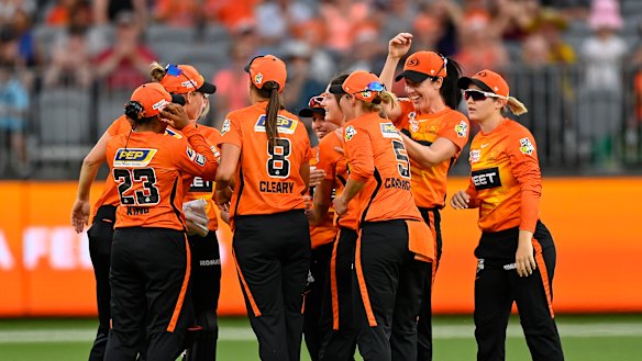 The Scorchers celebrate in Perth. 