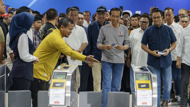 Indonesian President Joko Widodo, pictured at the 'soft' opening of Jakarta's first subway, has made spending on infrastructure a priority.