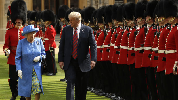 Donald Trump and the Queen inspect a Guard of Honour, formed of the Coldstream Guards at Windsor Castle.