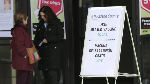 Signs about the measles vaccine are displayed at the Rockland County Health Department in New York.
