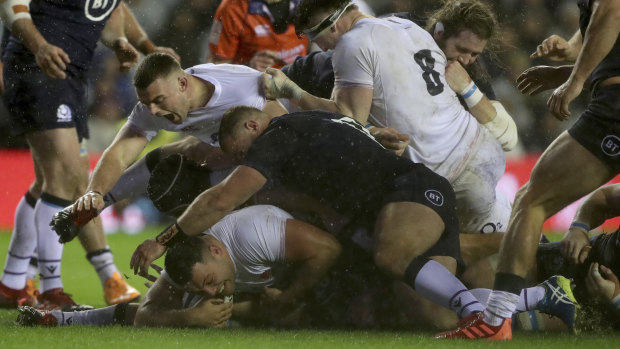 England's Ellis Genge goes over for the crucial try.
