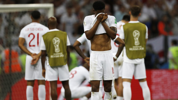 England's Marcus Rashford covers his face after losing the semi final.