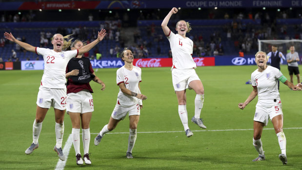 England celebrate their quarter-final triumph over Norway.