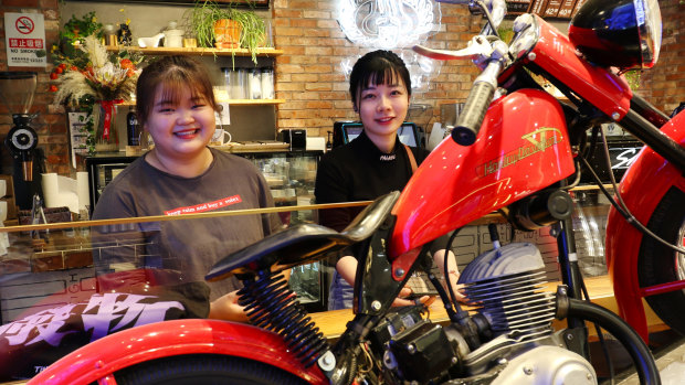 Hu Huiyyun, right, and friend at the American style Kiehl's beauty-cafe in Beijing.