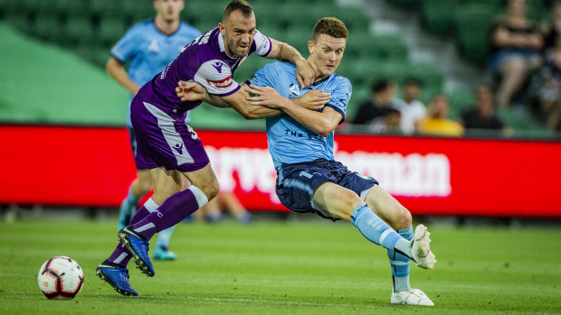 On the move?: Brandon O'Neill, right, wrestles with Perth Glory defender Ivan Franjic.