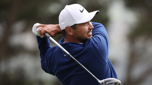 Jason Day has sought advice from Tiger Woods on alleviating back pain  from his swing.