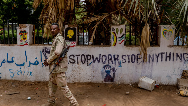 A soldier at the site outside Sudan’s military headquarters in Khartoum, where pro-democracy protesters were dispersed in a lethal attack by paramilitary forces on June 11.
