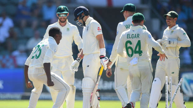 South Africa bowler Kagiso Rabada celebrates in front of Joe Root after bowling the England batsman during day one of the third Test in Port Elizabeth.