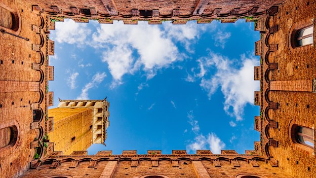 Siena’s Torre del Mangia, viewed from the internal courtyard of the Tuscan city’s town hall.