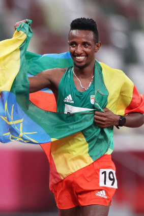 Selemon Barega celebrates winning gold in the 10,000m.