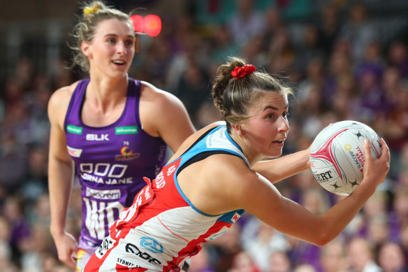 Maddy Proud of the NSW Swifts in action during a Super Netball match against the Firebirds in Brisbane last year. 