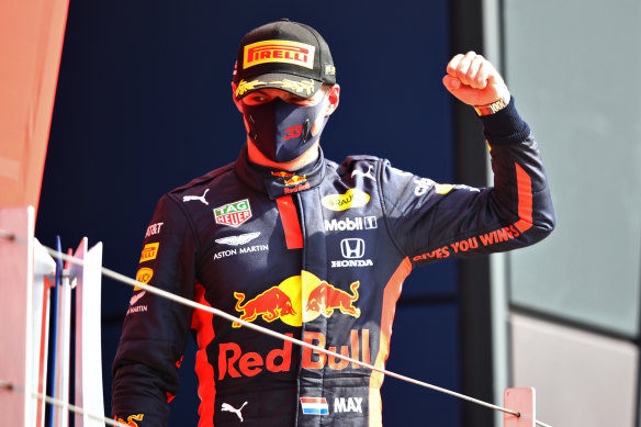 Red Bull Racing's Max Verstappen celebrates on the podium after winning the 70th Anniversary Grand Prix at Silverstone on Sunday.