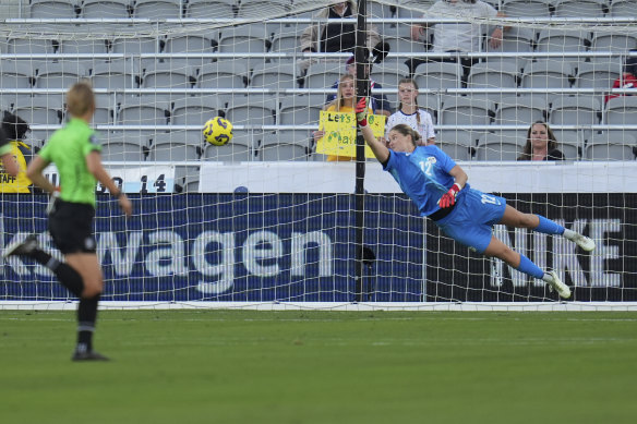 Wendy Bonilla shoots the ball straight past Tegan Micah to score for Colombia.