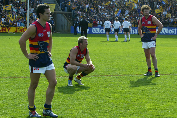 Dejected Crows players after the loss.