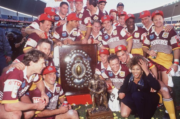 Tina Turner pictured with the Broncos, winners of the 1993 NRL grand final.