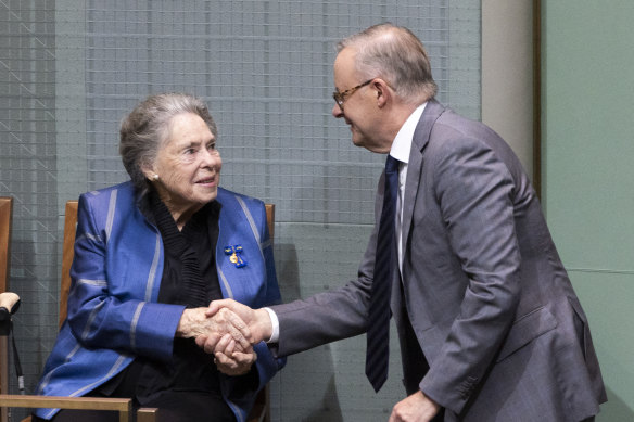 Dallas Hayden speaks to Prime Minister Anthony Albanese during a condolence motion for former governor-general Bill Hayden at Parliament House in November.