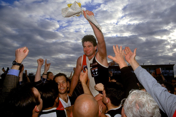 Danny Frawley is chaired off the ground after his last match in 1995.