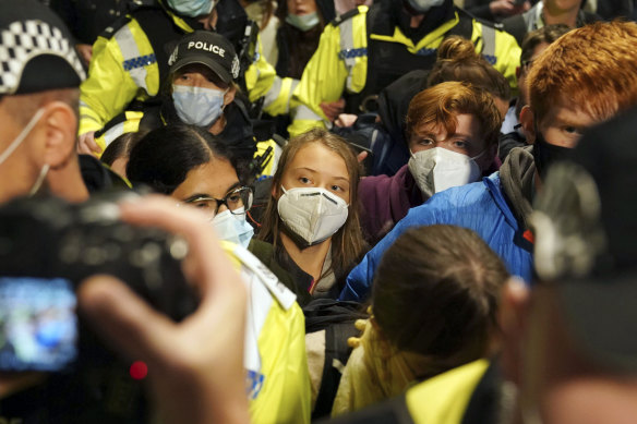 Greta Thunberg is mobbed after arriving in Glasgow for the COP26 summit.