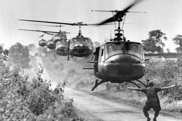 Huey helicopters, carrying troops of the US 173rd Airborne Brigade, settle in for a landing near the Montagnard village of Plei Ho Drong in August 1965.  