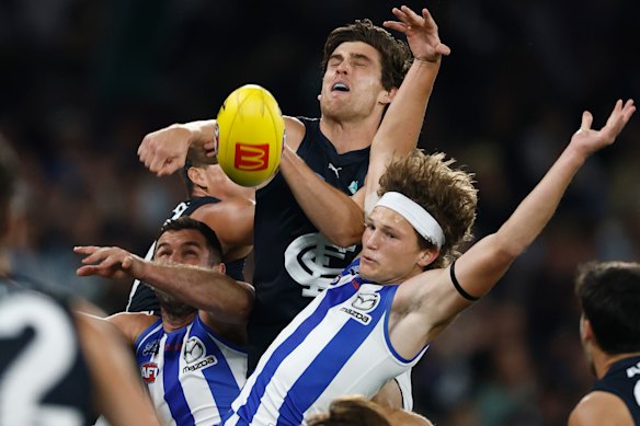 Jack Darling, Lewis Young and Zane Duursma compete for the ball.