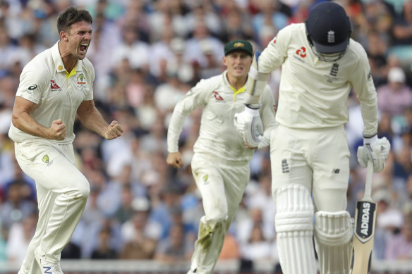 Mitchell Marsh celebrates taking the wicket of Sam Curran.