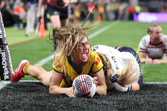 Jakiya Whitfield celebrates a try.