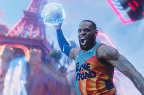 The real Lebron James dunks a cartoon ball.