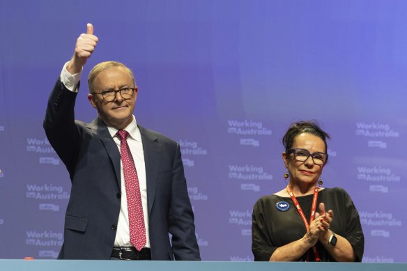Albanese and Burney acknowledge the applause at the national conference on Saturday.