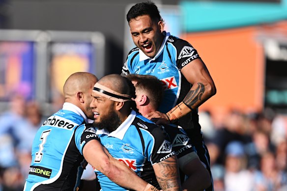 Cronulla celebrate an Addin Fonua-Blake try on Sunday.