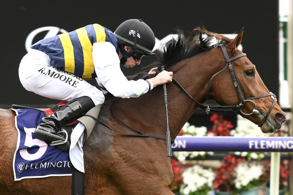 Jockey Ryan Moore rides True Self to victory in the Queen Elizabeth Stakes during Stakes Day. 