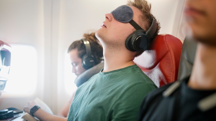 Travelers Face Back Pain From Sitting, Lifting and Unfamiliar Beds