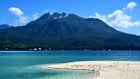 Idyllic White Island with Hibok-Hibok volcano in the background. It’s an uninhabited white sandbar located off the northern shore of Mambajao in Camiguin island, Philippines.