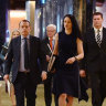 Crown Resorts executive chairman 
John Alexander (left) and company secretary Mary Manos arrive at the company's AGM on Thursday. 