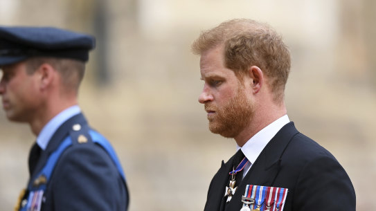 Britain’s Prince William and Prince Harry follow the State Hearse carrying the coffin of Queen Elizabeth II.