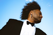 An invitation to the captain’s table is the perfect excuse to dust off a dinner jacket and bow tie. Ilai Jikoiono. He is photographed on board the new super yacht Solaré in Sydney.
