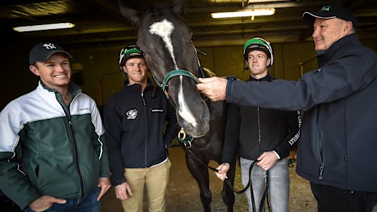 David Hayes (right), pictured with sons Ben, JD and Will.