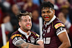 Selwyn Cobbo and Cameron Munster celebrate one of the hat-trick hero's tries.