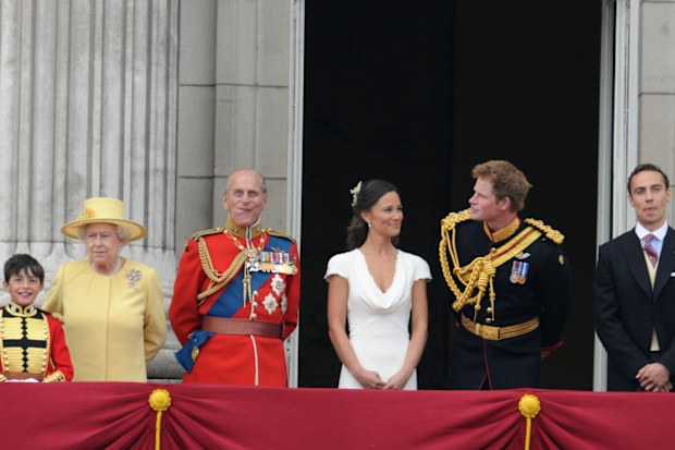 (L-R) Master William Lowther-Pinkerton, Queen Elizabeth II, Prince Philip, Duke of Edinburgh, Pippa Middleton, Prince Harry and James Middleton look at the crowds from the balcony of Buckingham Palace following the Royal Wedding of Their Royal Highnesses Prince William, Duke of Cambridge and Catherine, Duchess of Cambridge at Westminster Abbey on April 29, 2011 in London, England.